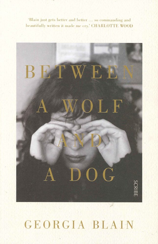 Between a Wolf and a Dog book cover