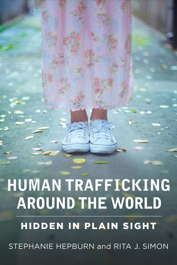 Human Trafficking Around the World: Hidden in Plain Sight cover