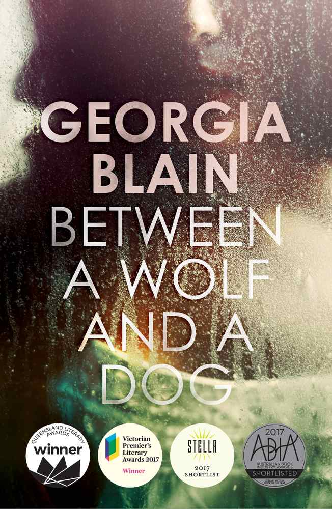 Between a Wolf and a Dog book cover